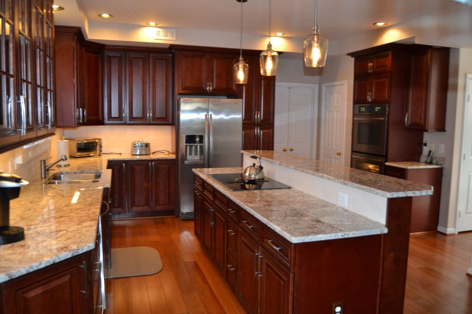 Modern kitchen with wooden cabinets and island.