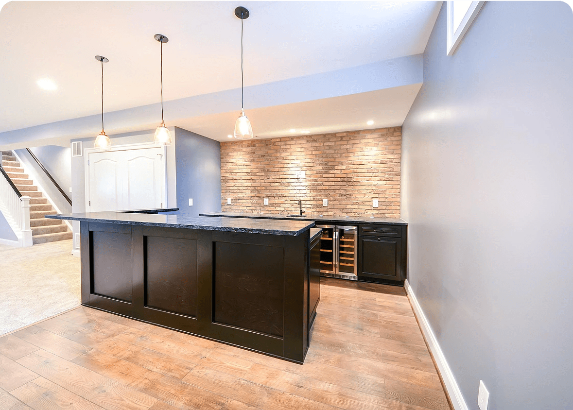 Modern kitchen island with pendant lighting.